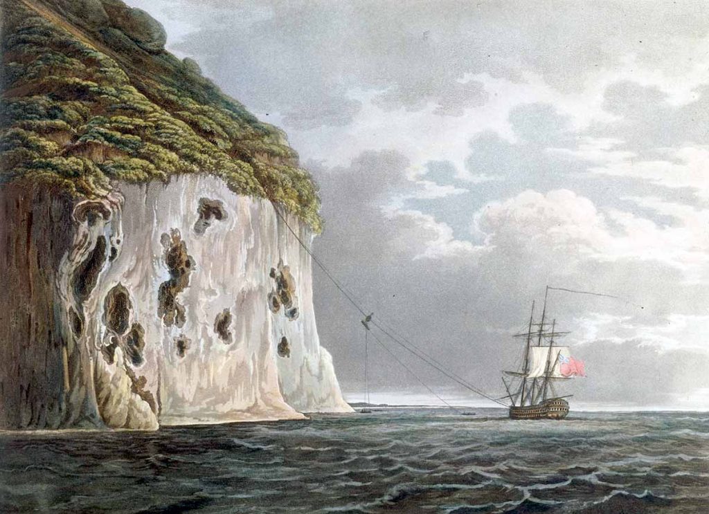 Vista sureste de Diamond Rock, con un cañón siendo izado desde el HMS Centaur por un cable